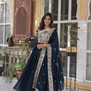 Women's Luxurious Plum Velvet Anarkali Gown with Heavy Gold Zari & Sequin Embroidery – Perfect for Weddings & Grand Festivities